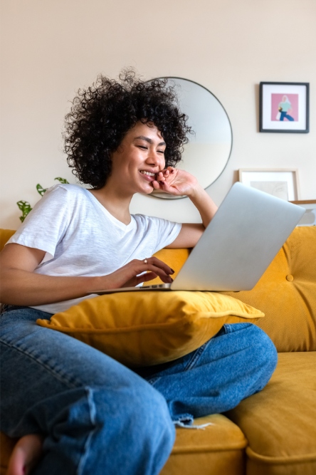 A woman enjoys virtual mental health services in Colorado.