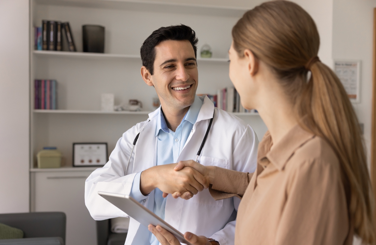 A woman talks to her doctor about addiction treatment in Colorado Springs.