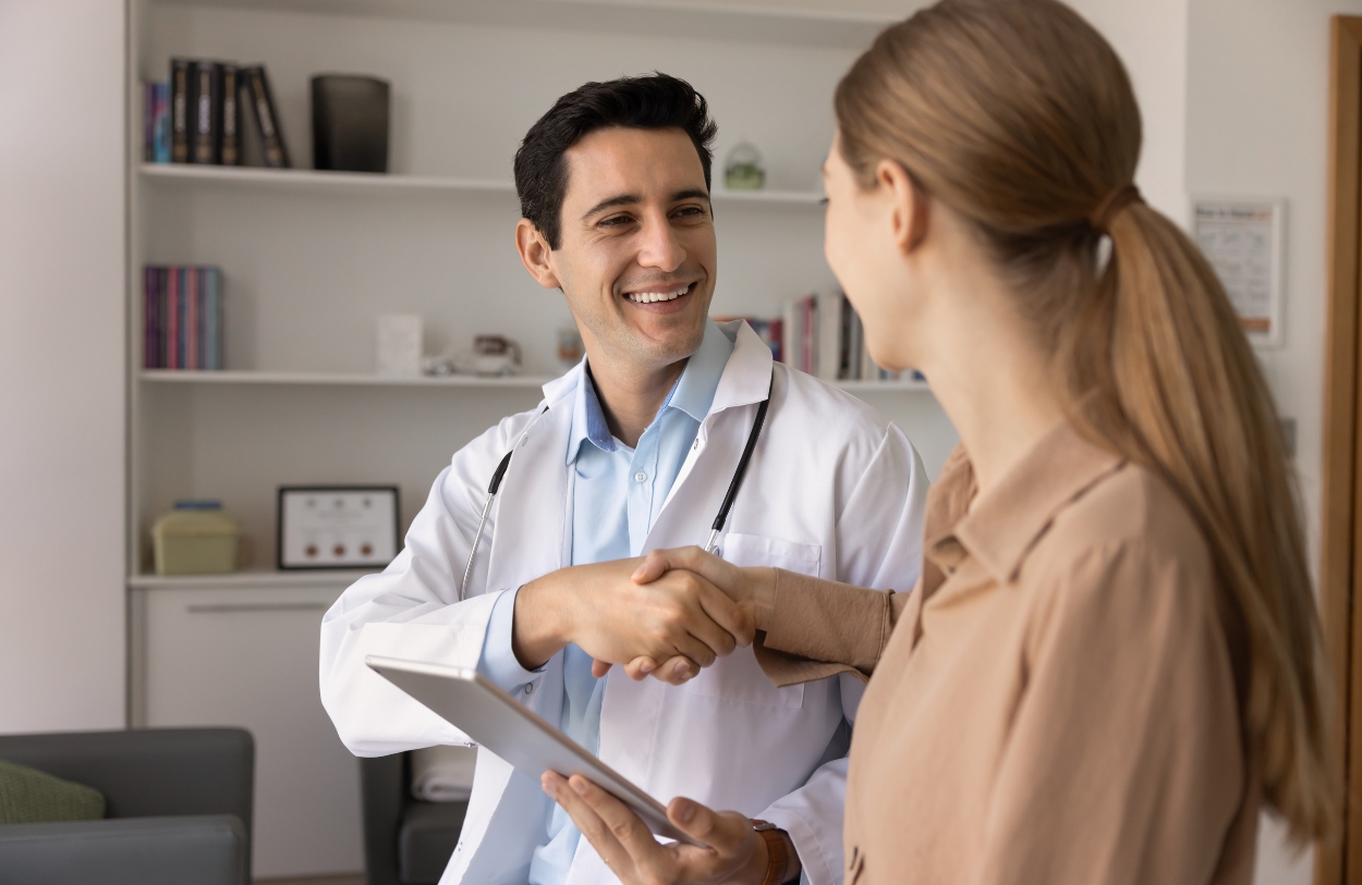 A woman talks to her doctor about insurance options for detox in Colorado Springs.