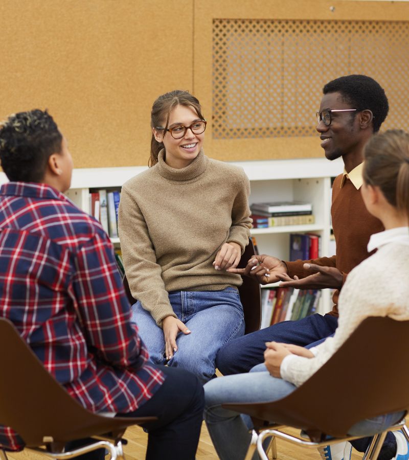 Small group discussion during group therapy in Colorado Springs.