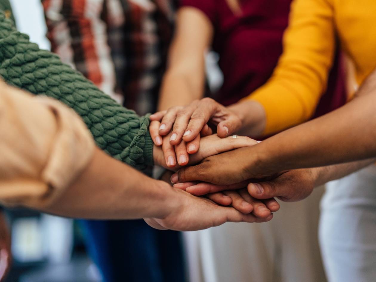 Clients supporting one another during group therapy in Colorado Springs.