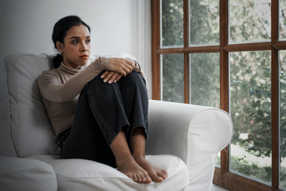 Young woman experiencing emotional distress associated with social anxiety symptoms at Drift Behavioral Health.